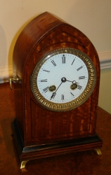 Small Satinwood table clock.