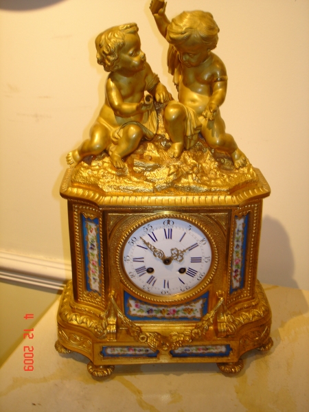 VERY FINE GILT BRONZE CLOCK