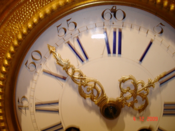 VERY FINE GILT BRONZE CLOCK