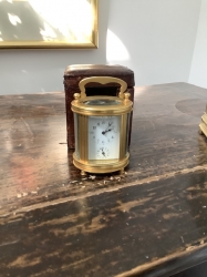 Miniature oval carriage clock